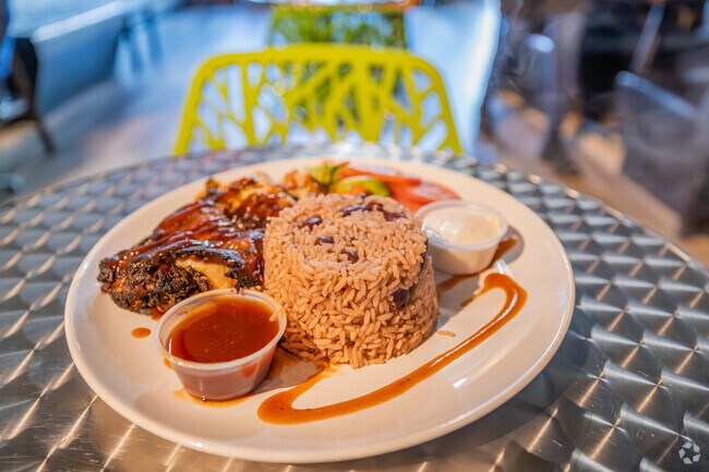 Paradise Sauce adds flavor to jerk chicken at Jerk Paradise near Park Manor.