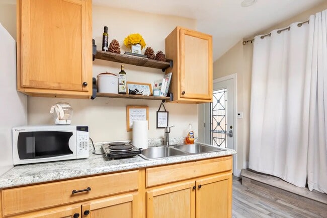 Kitchenette with all cookware and dishware