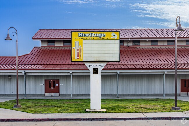 A large marquee greets students at the entrance to Heritage Elementary School in Tulare.