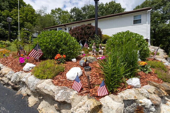 There are many well apponted yards in Mast Road neighborhood.