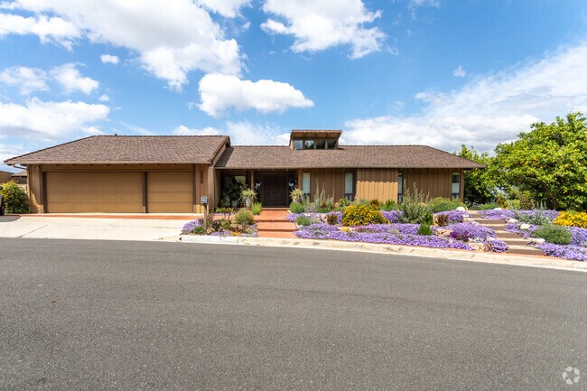 A hillside ranch-style home in Loma Linda, where modern design meets scenic views.