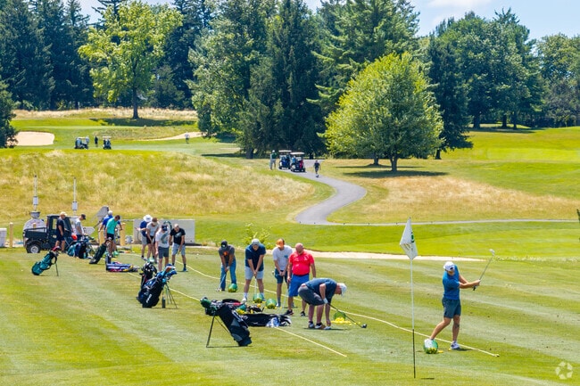 Golfers can practice their swings at the driving range at Overlook Park near New Holland.