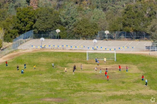 Rivergold Elementary School has a playground and basketball court.