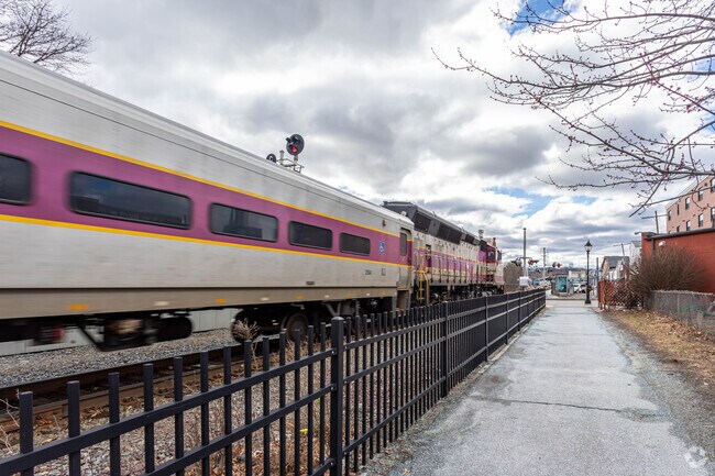Train passing through the South Side neighborhood of Waltham, MA.