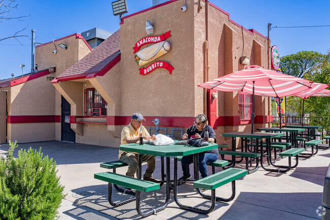A Jefferson couple enjoy their lunch in the bright outside patio of Taqueria Yarelis.