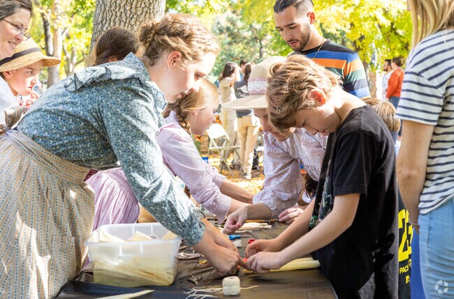 Kids get learn how to make items from the past at the Family Fall Crawl.
