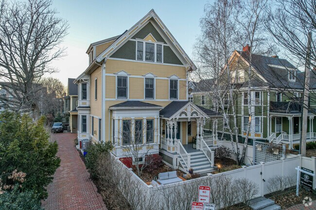 The Mid-Cambridge neighborhood has Queen Anne-style homes lining its streets.