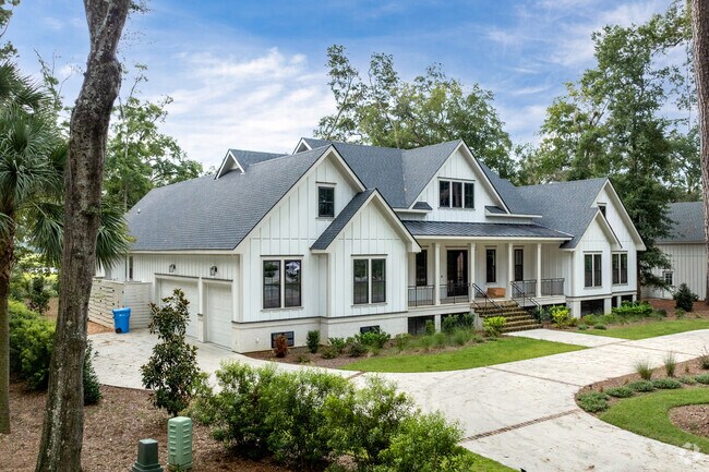 Large custom homes are popular in the Windmill Harbour neighborhood.
