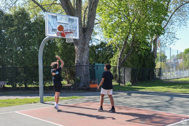 After school friends met up for a game of basketball at Ferullo field in North Woburn.