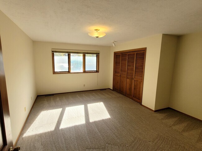 Large, sunny master bedroom