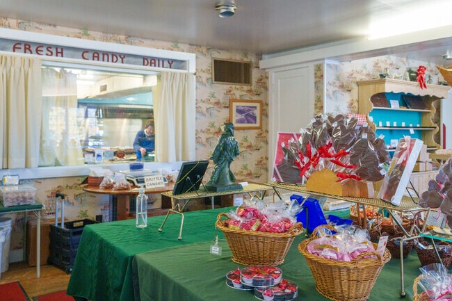 Peek through the window and watch the staff perform at Nichols Candies in West Gloucester.