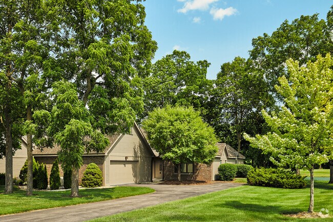 Condos rest on the fringes of Travis Pointe's golf course.