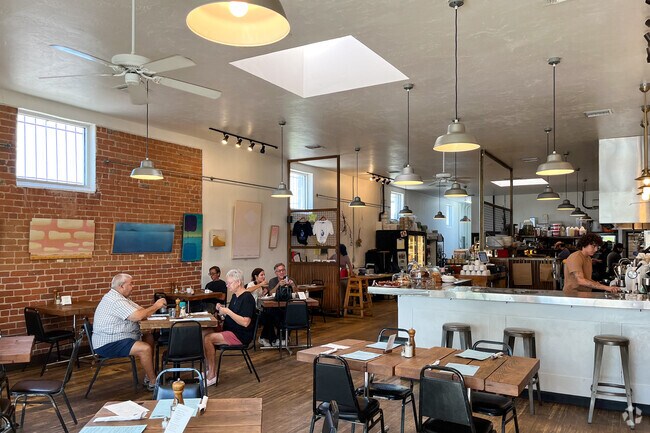 Locals and tourists flock to the very busy 5 Points Market in Barrio Santa Rosa.