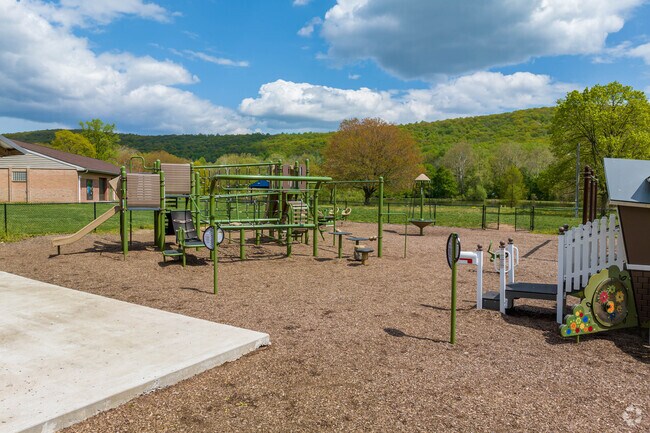 Parents can bring the children to the playground at beautiful Carsonia Park, near Pennside.