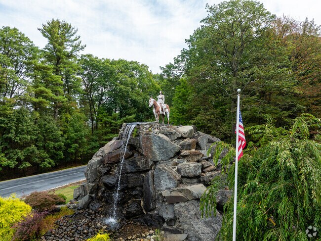 The iconic horse statue and waterfall mark the entrance to Lake Wynonah in South Manheim.