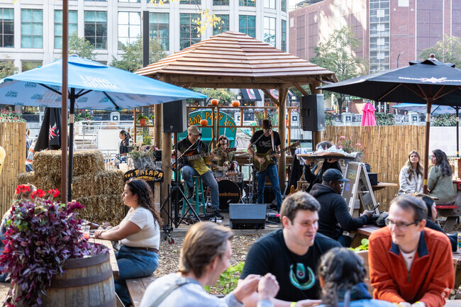 Listen to live bands during Fall Fest on the Riverwalk in New East Side.