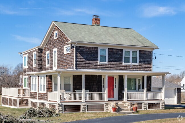 Farmhouses like this shingled beauty are part of the old charm of the Sachuest neighborhood.