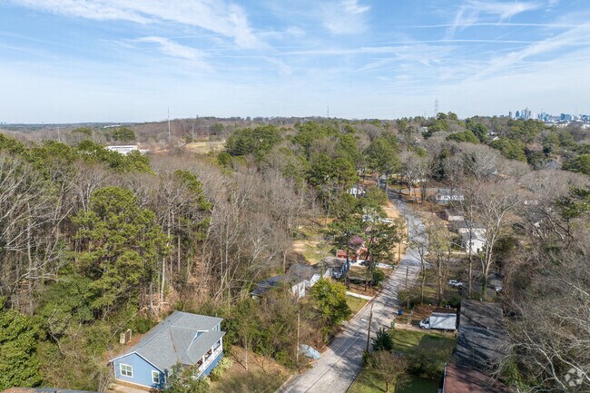 Carver Hills is a green neighborhood with steep streets and wooded lots.