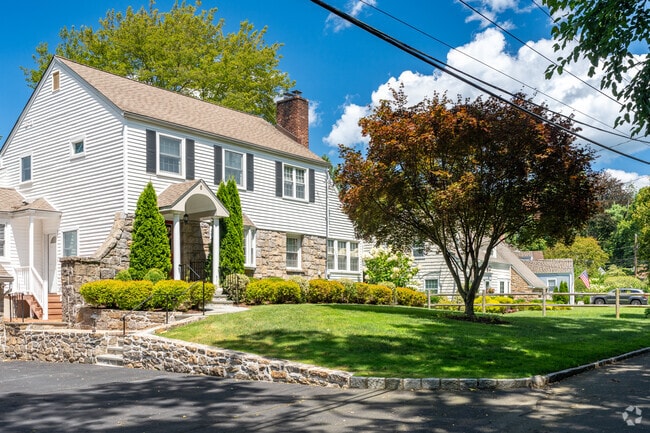 Residential architecture in Purchase includes well-maintained homes with classic masonry.