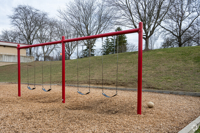 Students can swing away during recess and after school on the swings at Baker Elementary School.