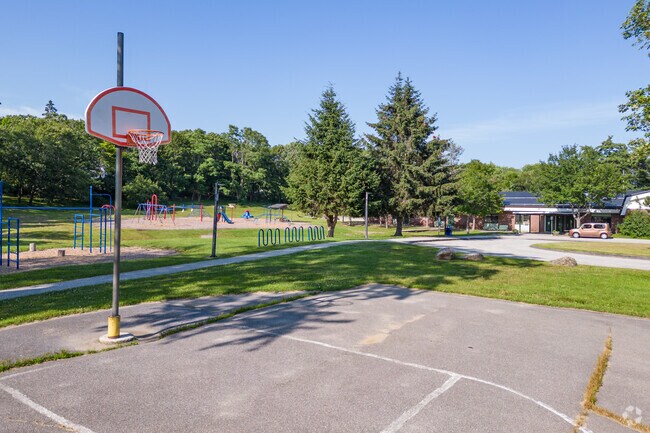 An outdoor basketball court is just one feature at the Fisher-Mitchell School.