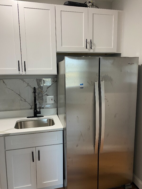 1211 Poplar Grove St, Baltimore, MD 21216 - photo 1