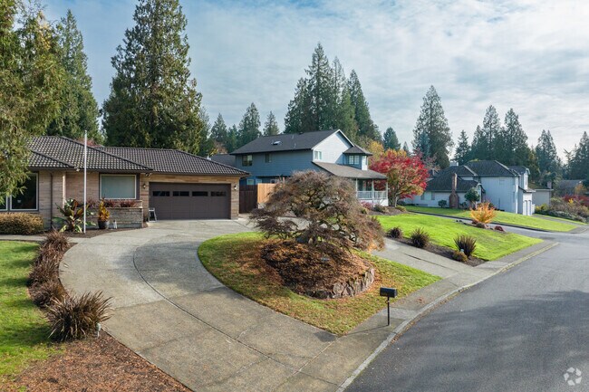 Large driveways are a feature of homes along SE Eastbrook Dr in Oatfield.