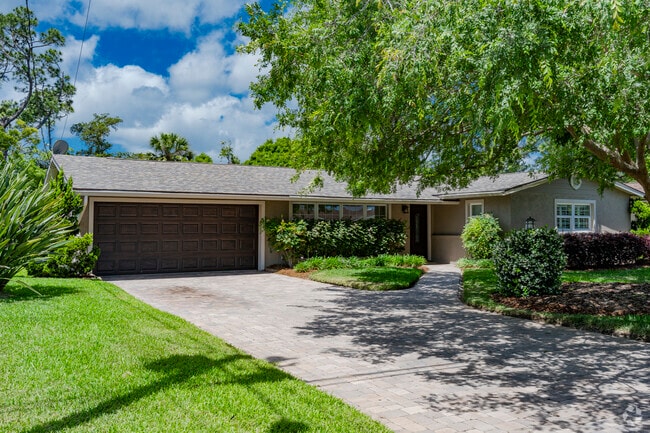 This Fairway home enjoys shade from ample tree coverage.