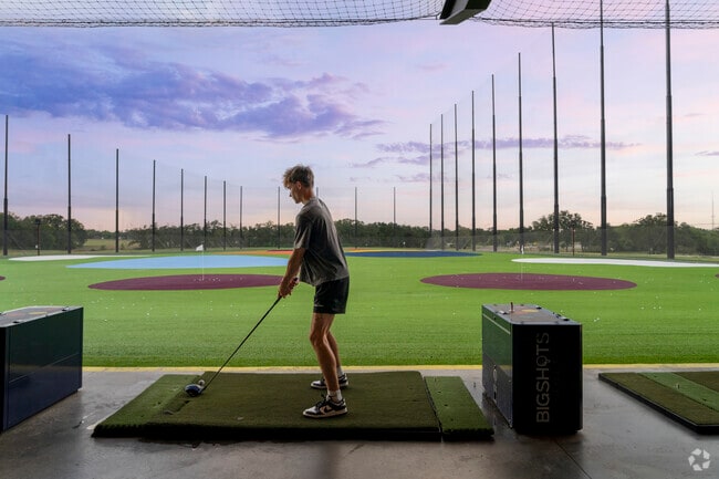 BigShots near Traditions Country Club offers fun golf practice and dining nearby.