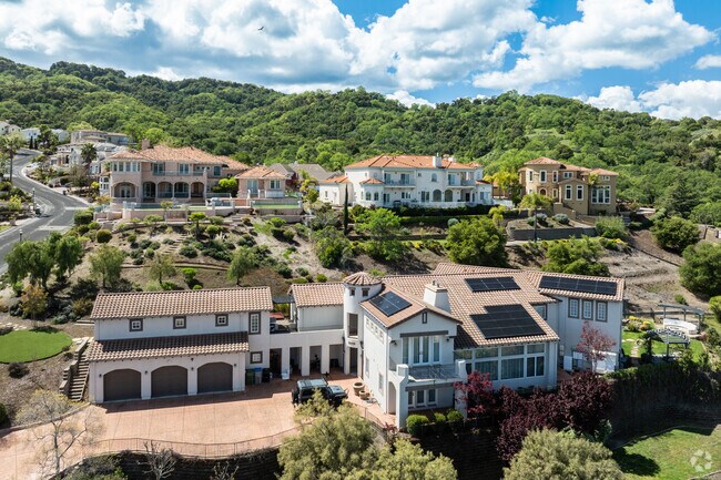 Grand facades and expansive lots define these luxury estates in South San Jose.