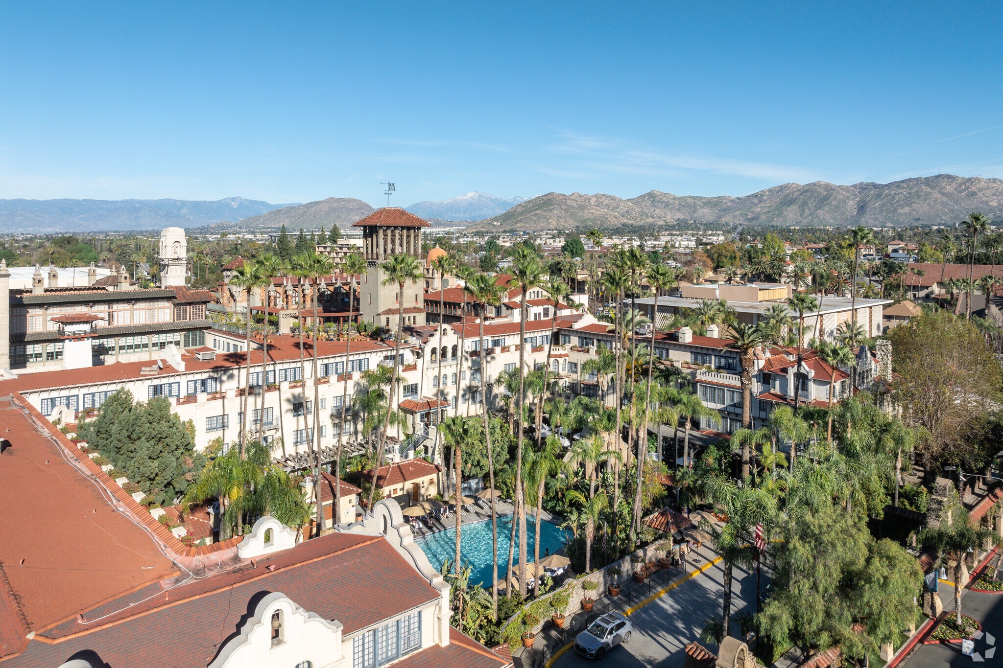 Relax by the pool at the historic Mission Inn Hotel and Spa in Downtown Riverside.