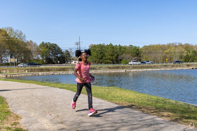 Discover the joy of childhood at Ballard Park in Tupelo, where laughter fills the air and children create unforgettable memories.