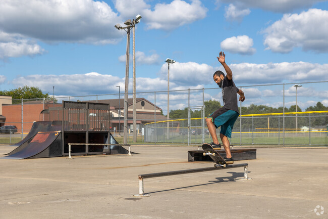 Riverview Park features a large skatepark with metal ramps and features near Hudson-Sterling.