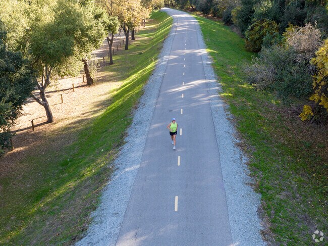 Gracefully jogging through Christmas Hill Park finding joy in every stride.