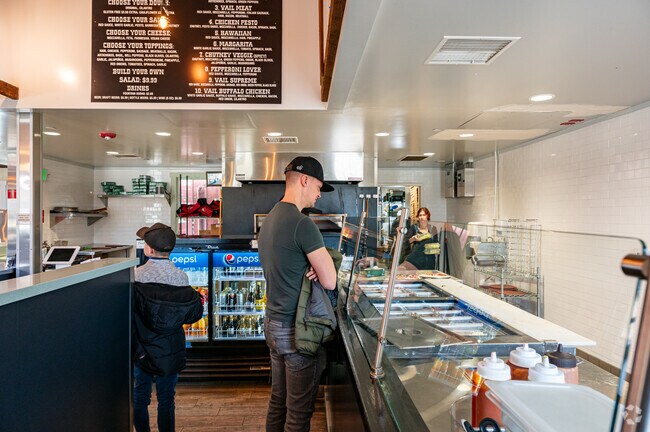 Vail Ranch residents enjoy customizing their pizzas at Vail Pizzeria.