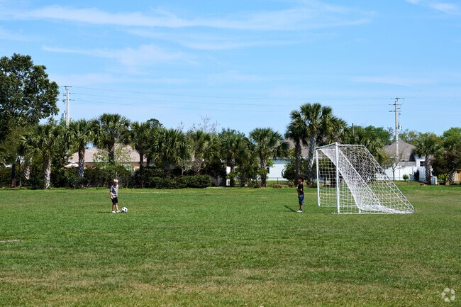 Woodland Trail Park has a soccer field to practice on and let children run about near Tradition.