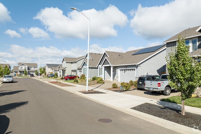 A Row of Traditional Contemporary Homes and Sidewalk in North Lancaster Neighborhood in Salem.