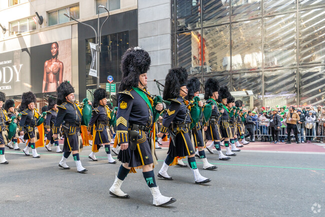 Pipe bands can be seen wearing traditional kilts during the St. Patrick's Day Parade.