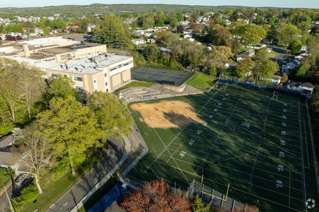 John F. Kennedy High School offers sports for students.