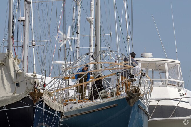 The Sandy Beach neighborhood is home to marinas and the opening of the season means boats are prepared for sailing.