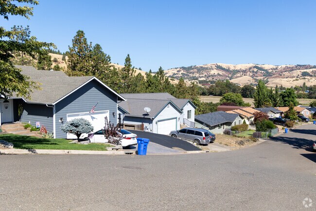Pretty residential streets with mountain views fill Green.