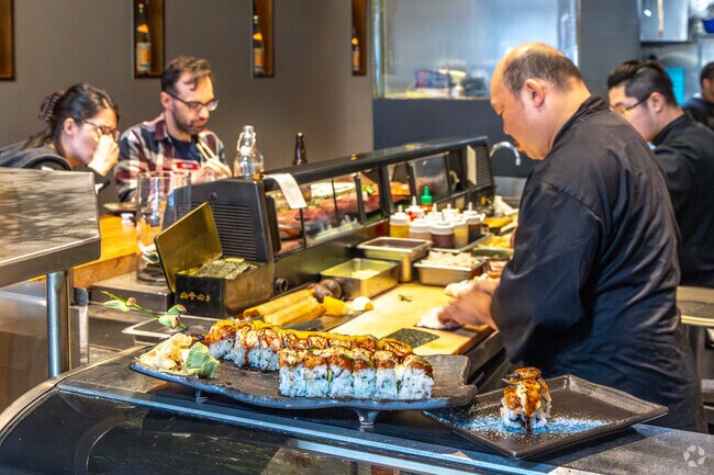 Chef Ole is preparing a signature sushi roll at Kakui in Montclair.