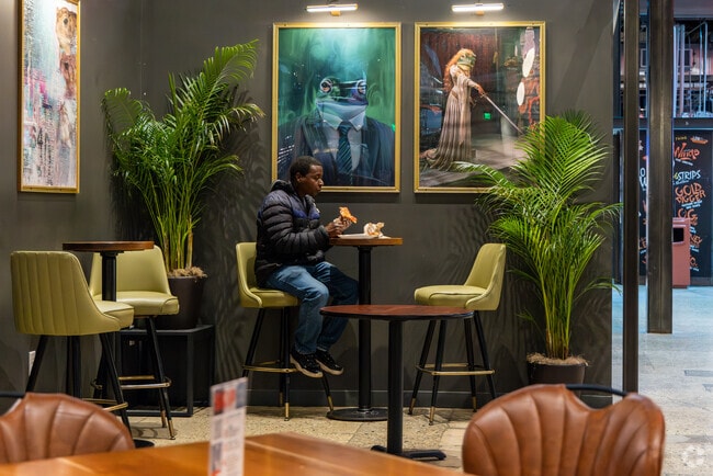 Grab a bite to eat after shopping at The Avenue near North Division.