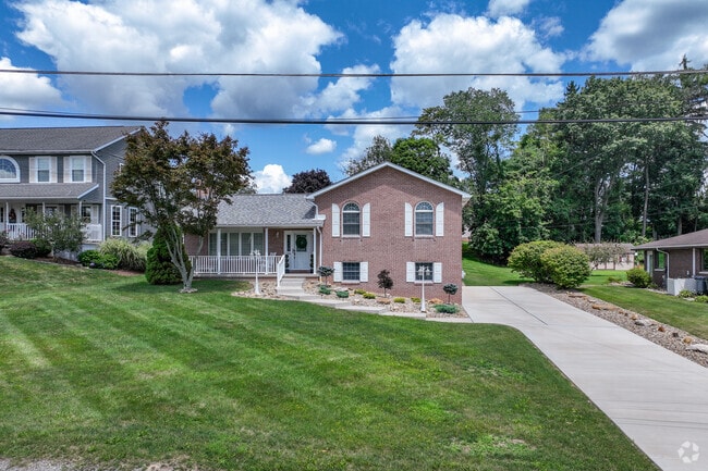 Split-level homes in Lower Burrell have a covered porch which is perfect for a sunny day.
