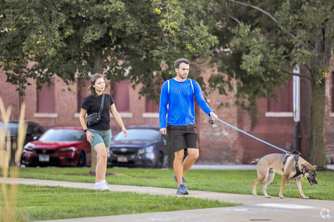 Neighbors enjoy strolls with their dogs along Enterprise's tranquil streets.