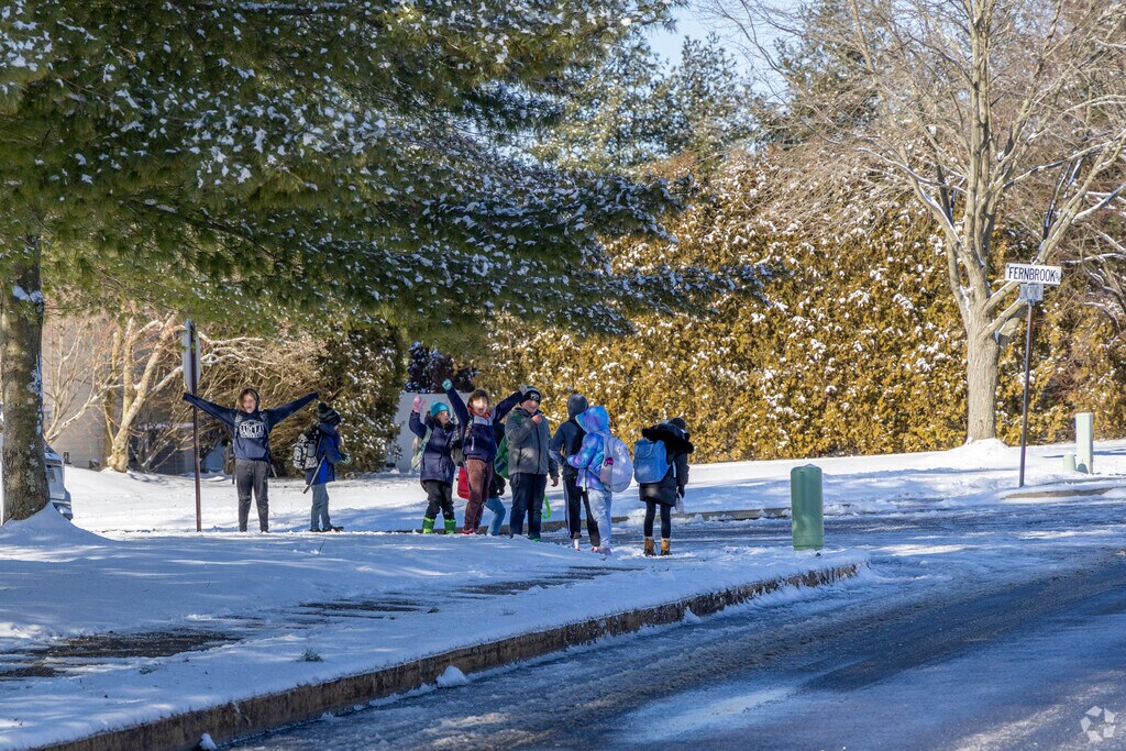 Kids love to play at Hidden Pond Park while they wait for the bus.