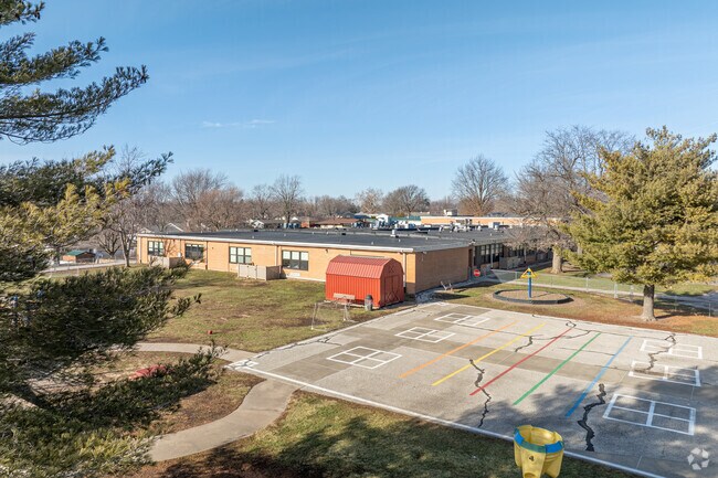 Pittsfield South Elementary School students have fun at recess in their large play area.