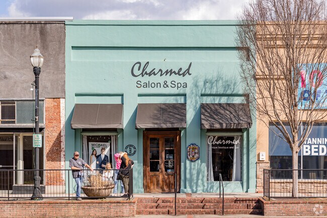 Local shops, like Charmed Salon & Spa, make up the heart of Milledgeville's downtown.