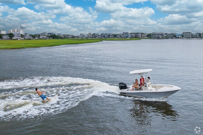 A family from Greenville Loop enjoys wakeboarding around Wrightsville Beach.