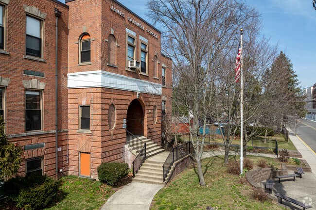 A flag flies proudly at the main entrance to Springfield's James Caldwell Elementary School.